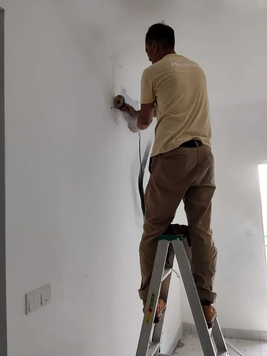 Acson PCB board repair in Klang — KL Renovator technician diagnosing control fault