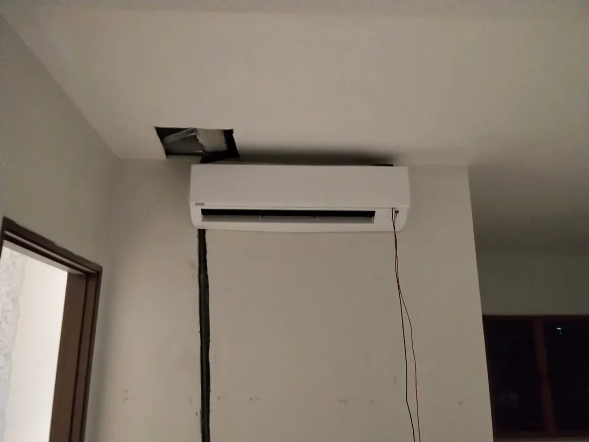 Midea aircond components washed individually during overhaul in Shah Alam