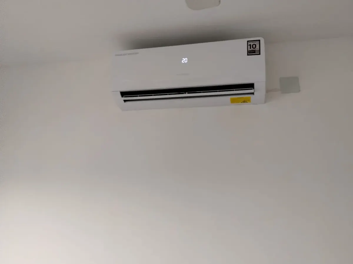 Mitsubishi inverter aircond checked during R32 refrigerant service in Kuala Lumpur
