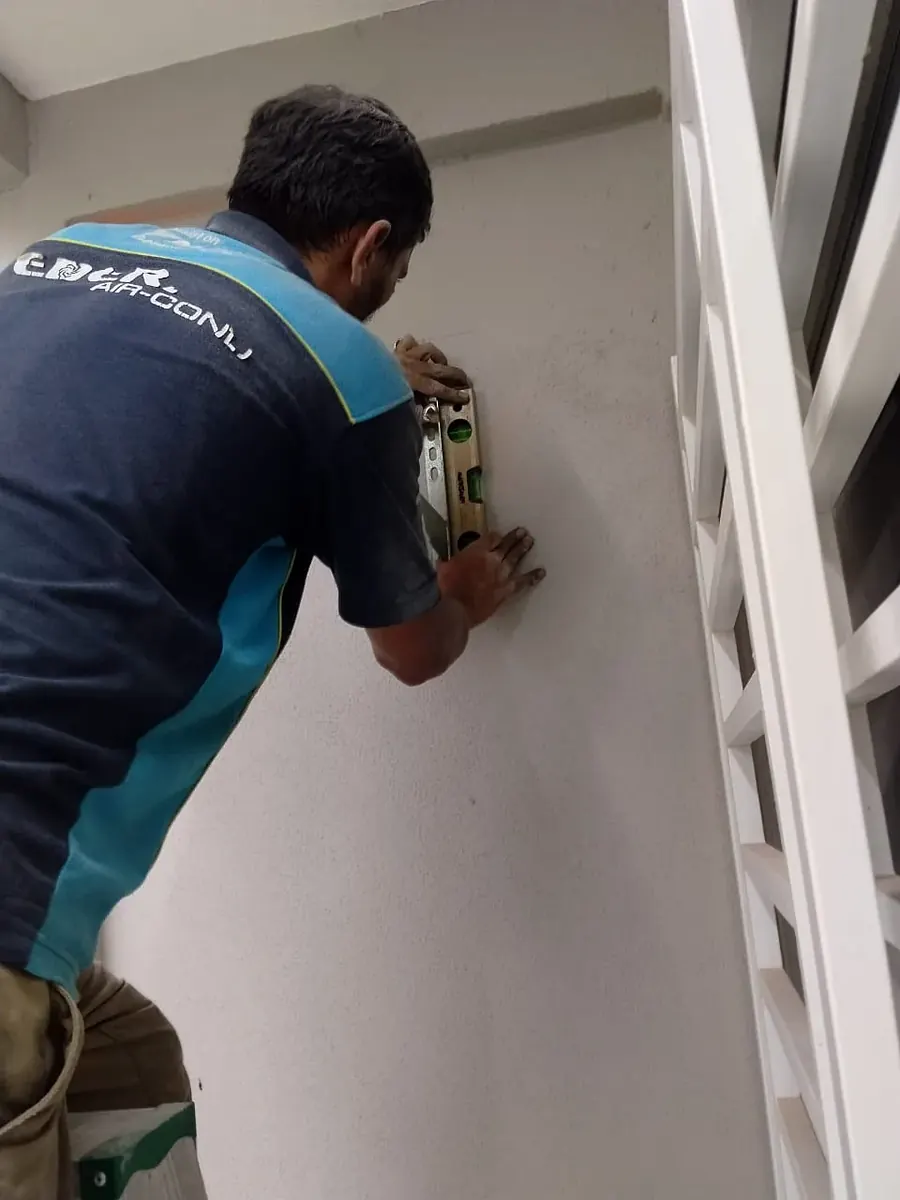 Mitsubishi water leaking repair in Subang Jaya — drain pan cleaning by KL Renovator technician