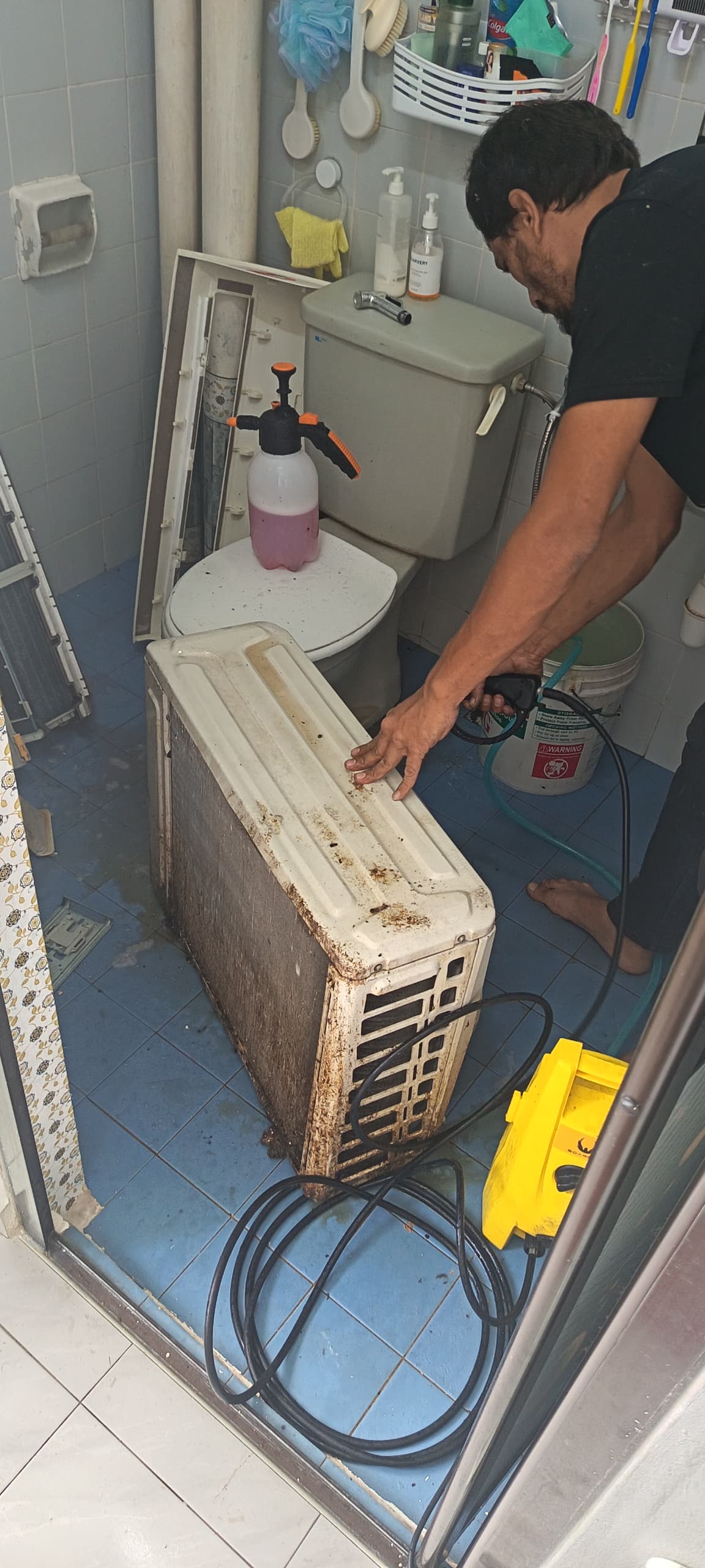 Technician at Work — Mont Kiara
